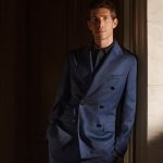 Spanish midfielder Sergi Roberto Carnicer wearing the navy look Brioni designed for the Como 1907 soccer team.