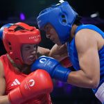 Britain's Chantelle Reid, left, fights Morocco's Khadija Mardi in their women's 75 kg preliminary boxing match at the 2024 Summer Olympics, Wednesday, July 31, 2024, in Paris, France. (AP Photo/Ariana Cubillos)