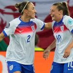 England's Ella Toone, right, celebrates with England's Lucy Bronze