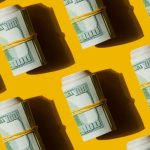 Abstract Pop Art Pattern of American dollars banknote bills on the yellow background