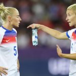 Alex Greenwood and Leah Williamson talk after England were beaten by France
