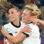 Germany's Jule Brand, 2nd right, celebrates after scoring the opening goal during the Euro 2025, group C, soccer match between Germany and Poland at Arena St. Gallen in St. Gallen, Switzerland, Friday, July 4, 2025. (AP Photo/Martin Meissner)