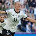 Germany's Lea Schueller celebrates after scoring her side's second goal during the Euro 2025, group C, soccer match between Germany and Denmark at St. Jakob-Park in Basel, Switzerland, Tuesday, July 8, 2025. (AP Photo/Martin Meissner)