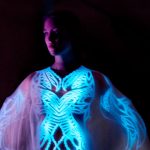 It’s Alive! Iris Van Herpen’s Latest Innovation? A Dress Made From 125 Million Bioluminescent Algae