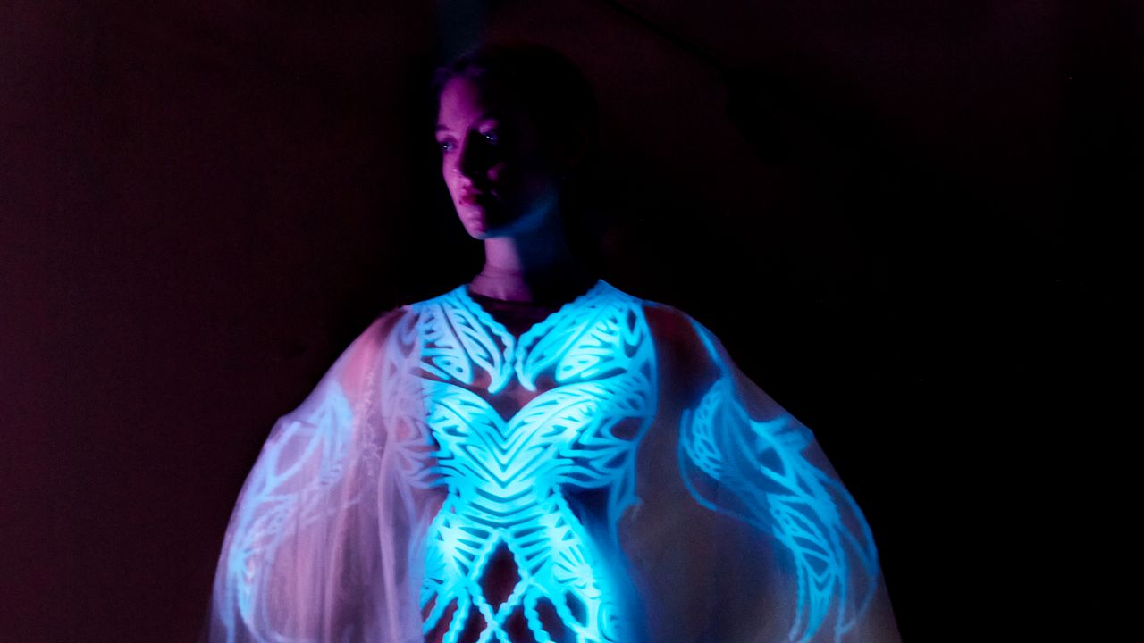 It’s Alive! Iris Van Herpen’s Latest Innovation? A Dress Made From 125 Million Bioluminescent Algae