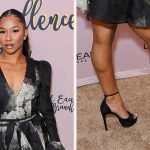 Jordan Chiles arrives at 2025 Black Excellence Brunch on July 6, 2025 in New Orleans in sky-high glittering black platform heels.
