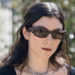 Lorde styles messy waves for the Chanel Fall 2025 Couture show.