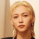 Stray Kids member Felix models pieces from the Louis Vuitton Silver Lockit collection