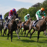 No Half Measures ridden by Neil Callan (orange cap) winning the Al Basti Equiworld, Dubai July Cup Stakes