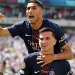 Fabian Ruiz (bottom) and Achraf Hakimi celebrate the former's goal for PSG against Real Madrid at the Club World Cup