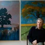 Nancy Cadogan with paintings from "The Lost Trees," her show at London's Garden Museum.
