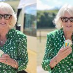 CALNE, ENGLAND - JULY 10: Queen Camilla smiles with a bouquet of flowers and an ice cream from Joanna Weaver's ice cream van during a visit to celebrate the 50th anniversary of the Wiltshire and Swindon Community Foundation at Manor Farm on July 10, 2025 in Calne, England. (Photo by Chris Jackson/Getty Images)