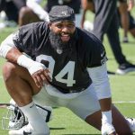Raiders star Christian Wilkins cut from NFL team after meeting room kissing incident