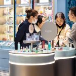 Chinese shoppers visiting a beauty counter at Deji Plaza, a luxury shopping mall in Nanjing, Jiangsu Province, China.