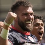 St Helens' Kyle Feldt celebrates scoring a try against Hull FC