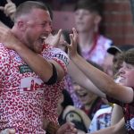 Leigh Leopards' Josh Charnley celebrates scoring his side's sixth try of the game