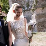 This Couture Bride’s Custom Gown Featured Hundreds of Mother-of-Pearl Buttons Belonging to Her Grandmother and Parents