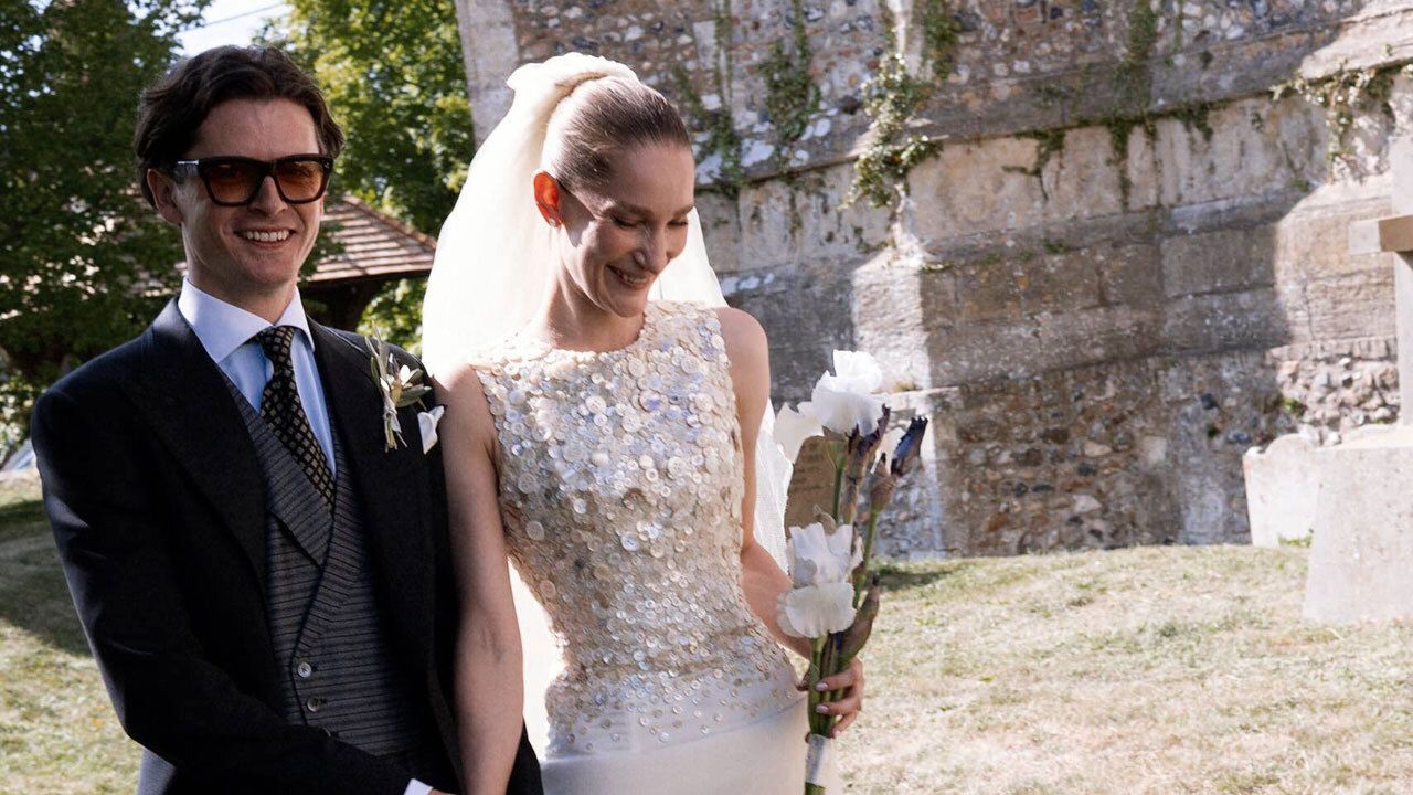 This Couture Bride’s Custom Gown Featured Hundreds of Mother-of-Pearl Buttons Belonging to Her Grandmother and Parents