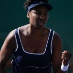 Venus Williams, of the United States, celebrates winning a point against Nao Hibino, of Japan, at the BNP Paribas Open tennis tournament