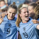 Vivianne Miedema of the Netherlands celebrates with team-mates after scoring the opening goal against Wales (Urs Flueeler/Keystone via AP)