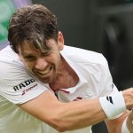 Cameron Norrie of United Kingdom returns a shot to Nicolas Jarry of Chile during their men's singles fourth-round match on day seven of the Wimbledon Championships at the All England Lawn Tennis and Croquet Club in London, July 6, 2025. ( The Yomiuri Shimbun via AP Images )