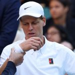 Italy's Jannik Sinner reacts as he receives medical treatment during his men's singles fourth round tennis match against Bulgaria's Grigor Dimitrov on the eighth day of the 2025 Wimbledon Championships at The All England Lawn Tennis and Croquet Club in Wimbledon, southwest London, on July 7, 2025. (Photo by Adrian Dennis / AFP) / RESTRICTED TO EDITORIAL USE