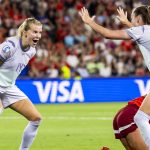 Norway's Ada Hegerberg, left, and Caroline Graham Hansen, right, celebrate an own goal by Switzerland