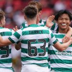 Reo Hatate is congratulated after doubling Celtic's lead at Aberdeen