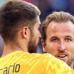Guglielmo Vicario (left) and Harry Kane embrace during Bayern Munich's 4-0 win over Tottenham in pre-season