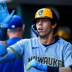 Brewers rally past Reds, tie club record with 13th straight win