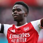 Bukayo Saka celebrates after doubling Arsenal's advantage against Leeds