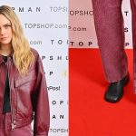 Cara Delevingne wears the Topshop Clover premium real leather loafers with ruched details in black at the brand's London Show on Saturday.