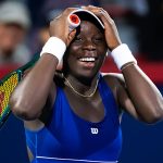 Canada's Victoria Mboko puts her hands on her head in disbelief and celebration after defeating top seed Coco Gauff in Montreal