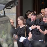 Mourners embrace following the funeral of Martha Nolan-O'Slatarra at the Cathedral of the Assumption, Carlow. Ms Nolan-O'Slatarra, 33, was discovered unconscious on the boat at Montauk Yacht Club, New York, in the early hours of August 5. Picture date: Wednesday August 20, 2025. (Photo by Niall Carson/PA Images via Getty Images)