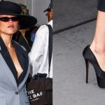 Jenna Ortega wearing Christian Louboutin pumps.