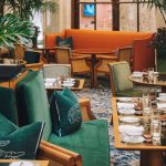 Le Café Lacoste, an exclusive Afternoon Tea, takes place at The Plaza Hotel at The Palm Court.
