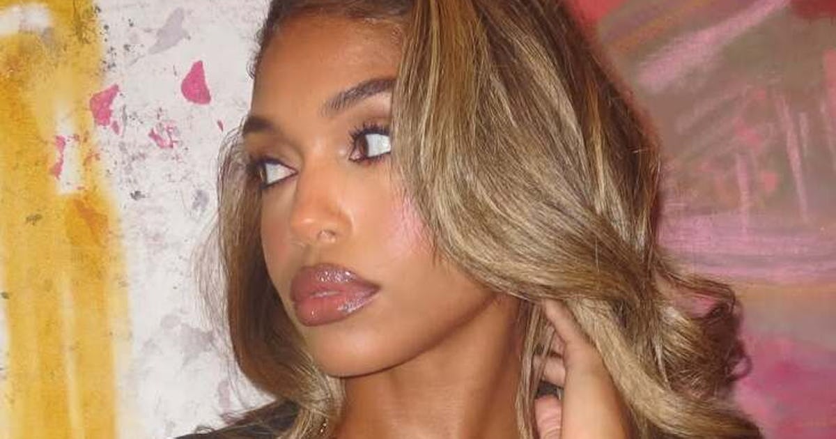 Lori Harvey’s Sleek Updo Is The Unexpected Star Of Her Vacation Style