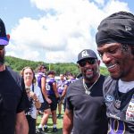 Michael Phelps attends Ravens training camp, teaches team to swim