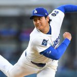 Ohtani takes big leap, earns first win of season for Dodgers