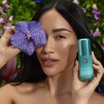 Stephanie Suganami holding Tatcha's new Longevity Serum