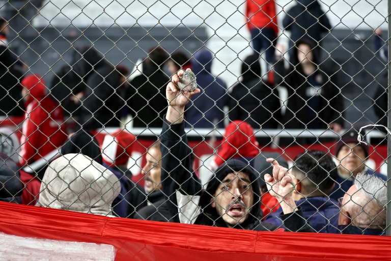 Ten hurt, 90 arrested as match abandoned following fan violence in Argentina