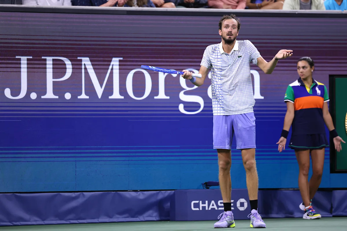 US Open: Benjamin Bonzi upsets Daniil Medvedev after photographer walks onto court, causing wild delay