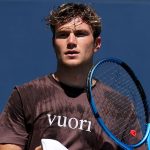 Jack Draper of Great Britain walks back to his chair with his towel during a practice session ahead of the US Open at USTA Billie Jean King