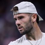 Jacob Fearnley of the United Kingdom looks on against Alexander Zverev of Germany during their Men's Singles Second Round match on Day Five