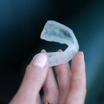 One of the new flashing mouthguards, designed to help alert officials to potential concussion