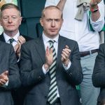 Celtic chairman Peter Lawwell (L) and chief exec Michael Nicholson (C)  were watching at Celtic Park