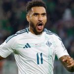 Northern Ireland's Jamie Reid celebrates after scoring the opening goal against Luxembourg. (AP Photo/Geert Vanden Wijngaert)