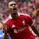 Ryan Gravenberch wheels away to celebrates after opening the scoring for Liverpool in the Merseyside derby