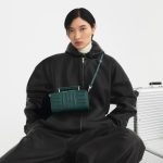 A cross-body style from Rimowa's new range of leather bags, dubbed the Groove Collection.