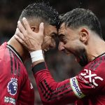 Goalscorers Casemiro and Bruno Fernandes celebrate at Old Trafford